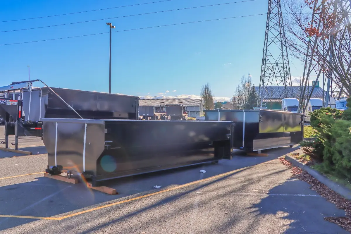 Roll-off dumpster ready for waste disposal at job site for Yard Waste Dumpster Rental in Tysons